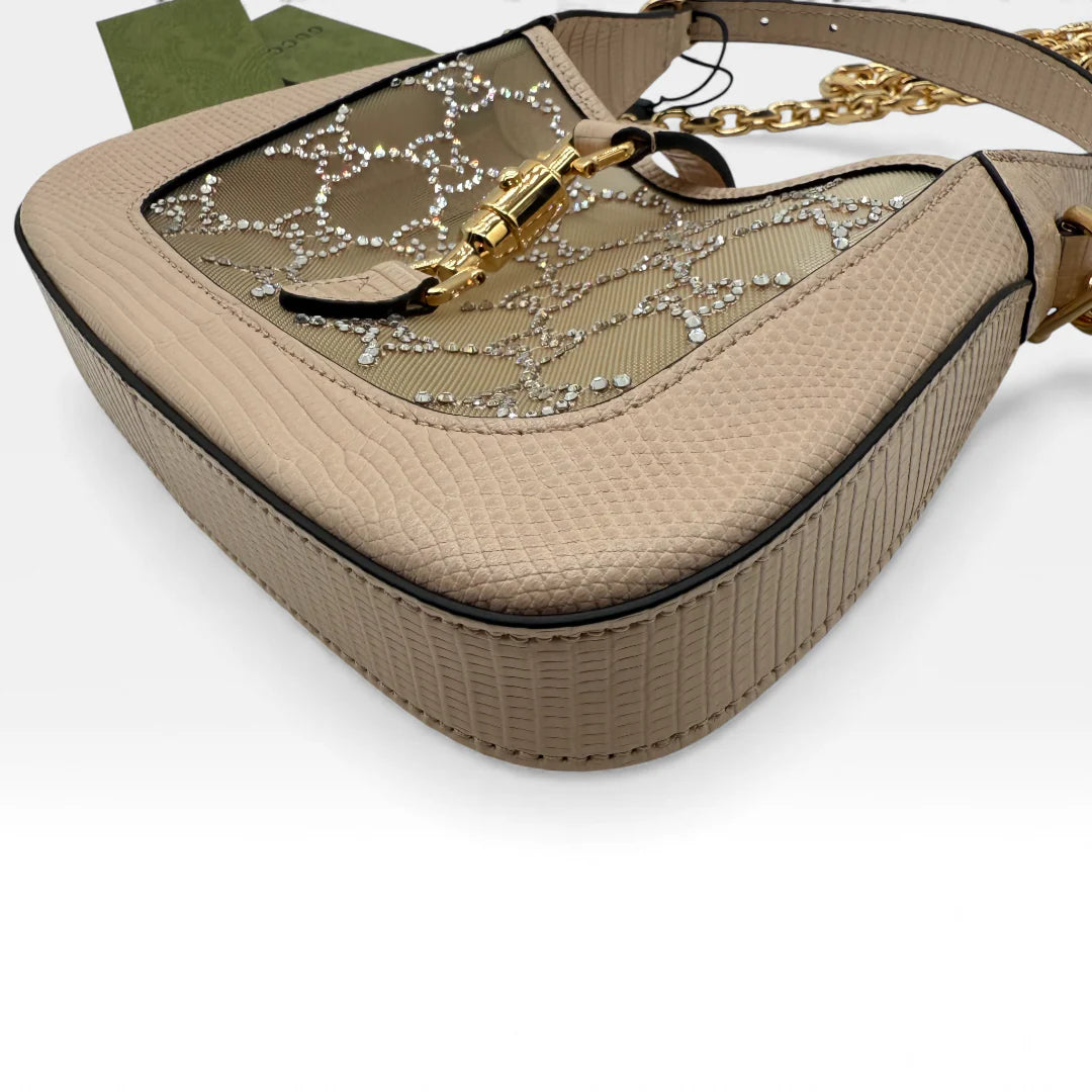 https://cdn.shopify.com/s/files/1/0564/9376/8855/files/Gucci_Jacky_Crystal_vintage_5746.webp?v=1765456307