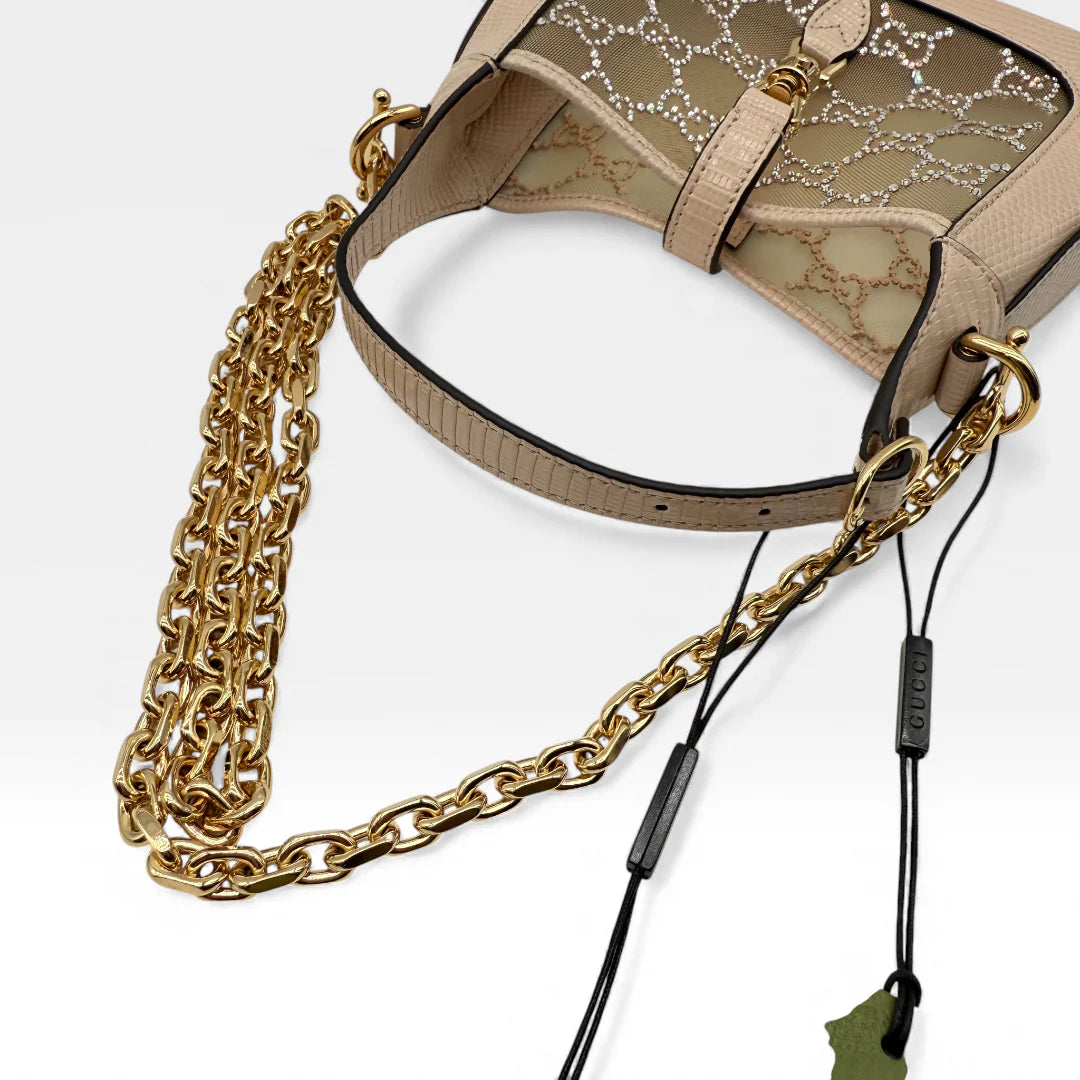 https://cdn.shopify.com/s/files/1/0564/9376/8855/files/Gucci_Jacky_Crystal_vintage_5750.webp?v=1765456307