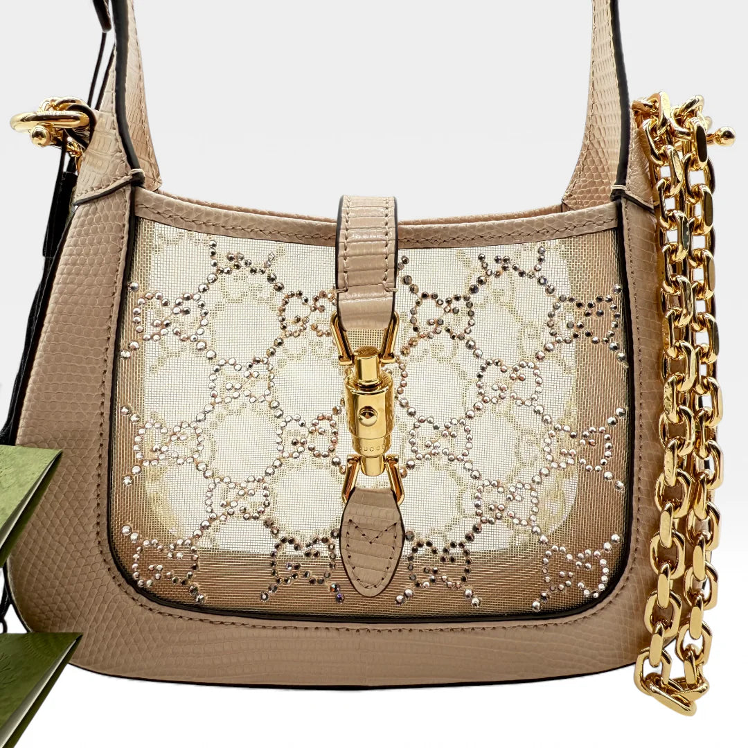 https://cdn.shopify.com/s/files/1/0564/9376/8855/files/Gucci_Jacky_Crystal_vintage_5751.webp?v=1765456307