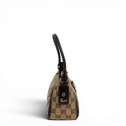 https://cdn.shopify.com/s/files/1/0564/9376/8855/files/Gucci_Pochette_Abbey_D-Ring_monogram_beige_vintage_GG6918.webp?v=1779325749