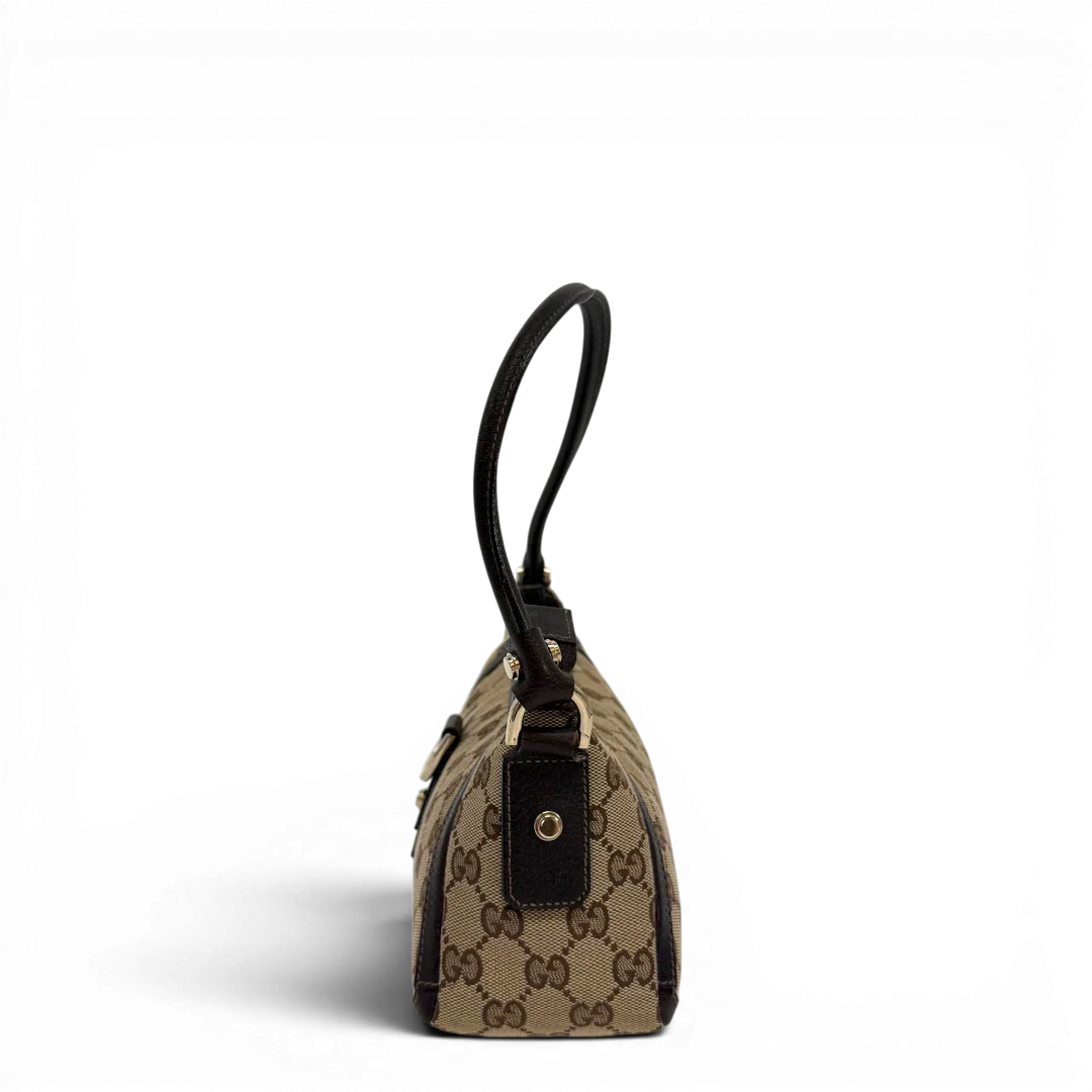 https://cdn.shopify.com/s/files/1/0564/9376/8855/files/Gucci_Pochette_Abbey_D-Ring_monogram_beige_vintage_GG6920.webp?v=1779325750