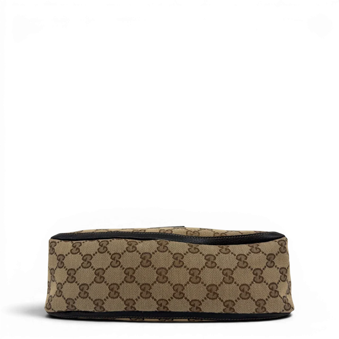https://cdn.shopify.com/s/files/1/0564/9376/8855/files/Gucci_Pochette_Abbey_D-Ring_monogram_beige_vintage_GG6921.webp?v=1779325750