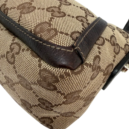 https://cdn.shopify.com/s/files/1/0564/9376/8855/files/Gucci_Pochette_Abbey_D-Ring_monogram_beige_vintage_GG6923.webp?v=1779325750
