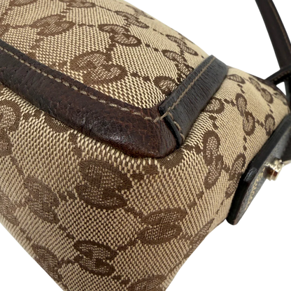 https://cdn.shopify.com/s/files/1/0564/9376/8855/files/Gucci_Pochette_Abbey_D-Ring_monogram_beige_vintage_GG6924.webp?v=1779325750