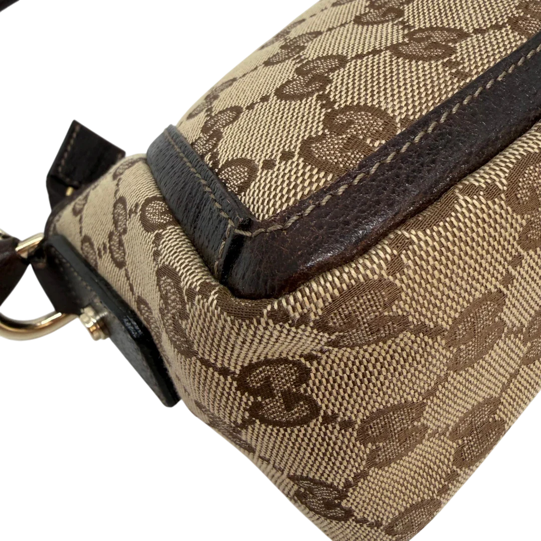 https://cdn.shopify.com/s/files/1/0564/9376/8855/files/Gucci_Pochette_Abbey_D-Ring_monogram_beige_vintage_GG6925.webp?v=1779325750