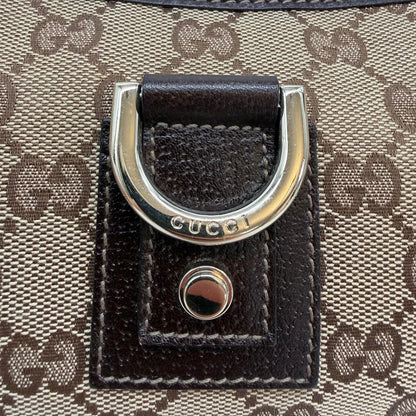 https://cdn.shopify.com/s/files/1/0564/9376/8855/files/Gucci_Pochette_Abbey_D-Ring_monogram_beige_vintage_GG6927.webp?v=1779325751