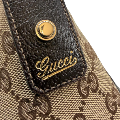 https://cdn.shopify.com/s/files/1/0564/9376/8855/files/Gucci_Pochette_Abbey_D-Ring_monogram_beige_vintage_GG6928.webp?v=1779325751