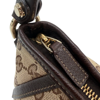 https://cdn.shopify.com/s/files/1/0564/9376/8855/files/Gucci_Pochette_Abbey_D-Ring_monogram_beige_vintage_GG6929.webp?v=1779325750