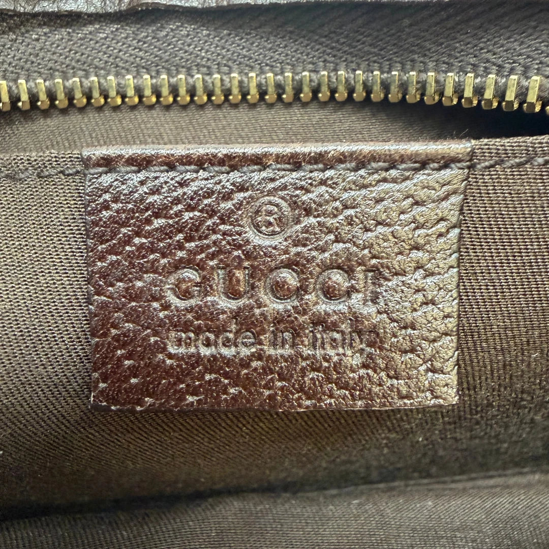 https://cdn.shopify.com/s/files/1/0564/9376/8855/files/Gucci_Pochette_Abbey_D-Ring_monogram_beige_vintage_GG6931.webp?v=1779325751