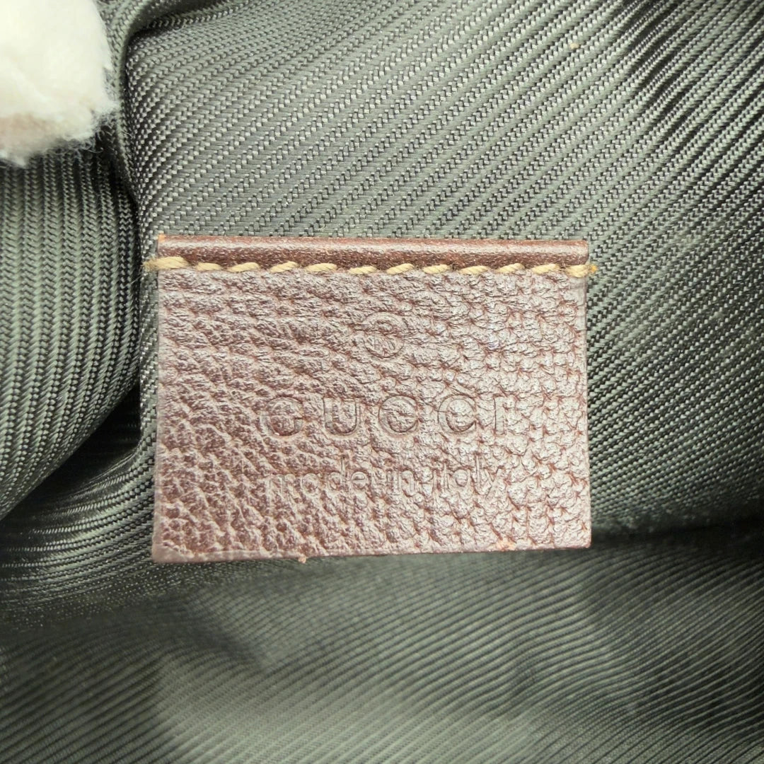 https://cdn.shopify.com/s/files/1/0564/9376/8855/files/Gucci_Pochette_Abbey_monogram_beige_13.webp?v=1782386168