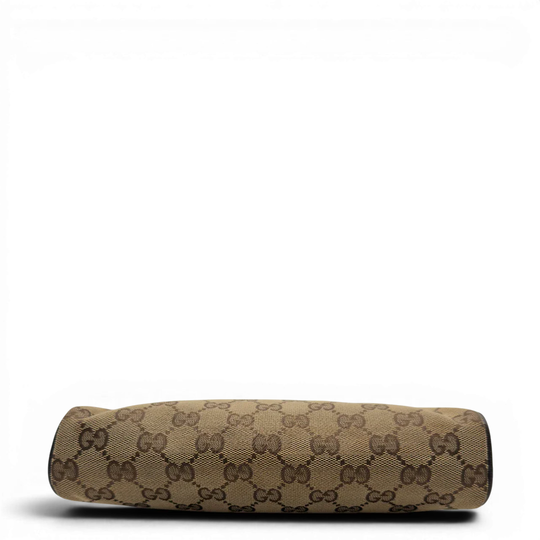 https://cdn.shopify.com/s/files/1/0564/9376/8855/files/Gucci_Pochette_Abbey_monogram_beige_5.webp?v=1782386167