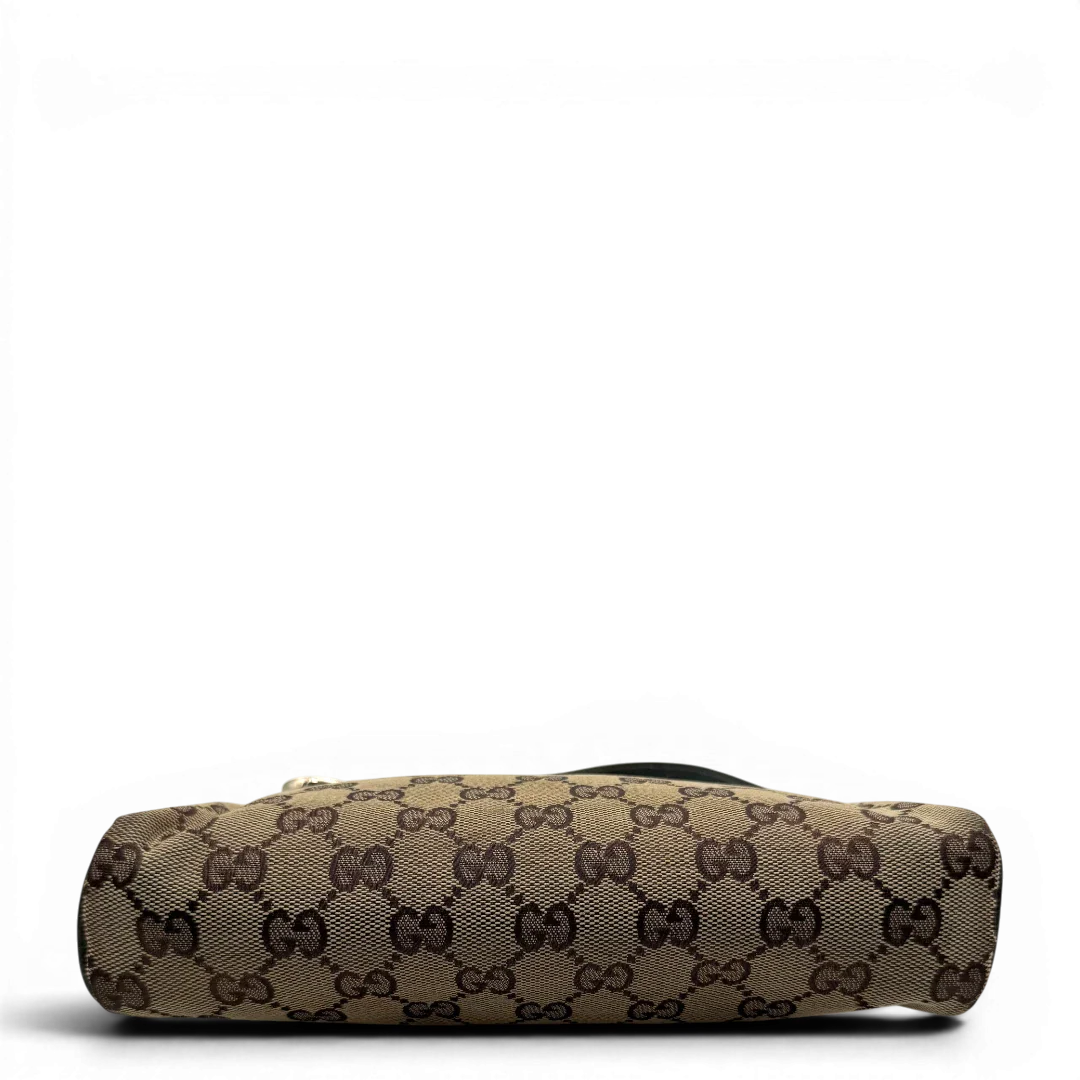 https://cdn.shopify.com/s/files/1/0564/9376/8855/files/Gucci_Pochette_Abbey_monogram_beige_vintage_GG1732.webp?v=1779408432