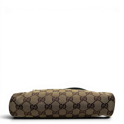 https://cdn.shopify.com/s/files/1/0564/9376/8855/files/Gucci_Pochette_Abbey_monogram_beige_vintage_GG1732.webp?v=1779408432
