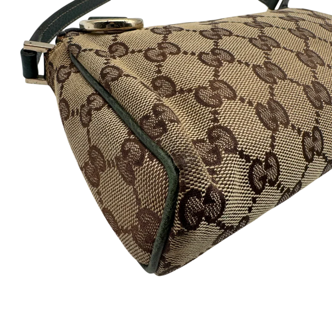 https://cdn.shopify.com/s/files/1/0564/9376/8855/files/Gucci_Pochette_Abbey_monogram_beige_vintage_GG1733.webp?v=1779408432