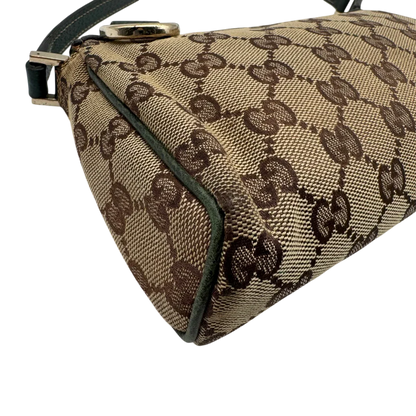 https://cdn.shopify.com/s/files/1/0564/9376/8855/files/Gucci_Pochette_Abbey_monogram_beige_vintage_GG1733.webp?v=1779408432