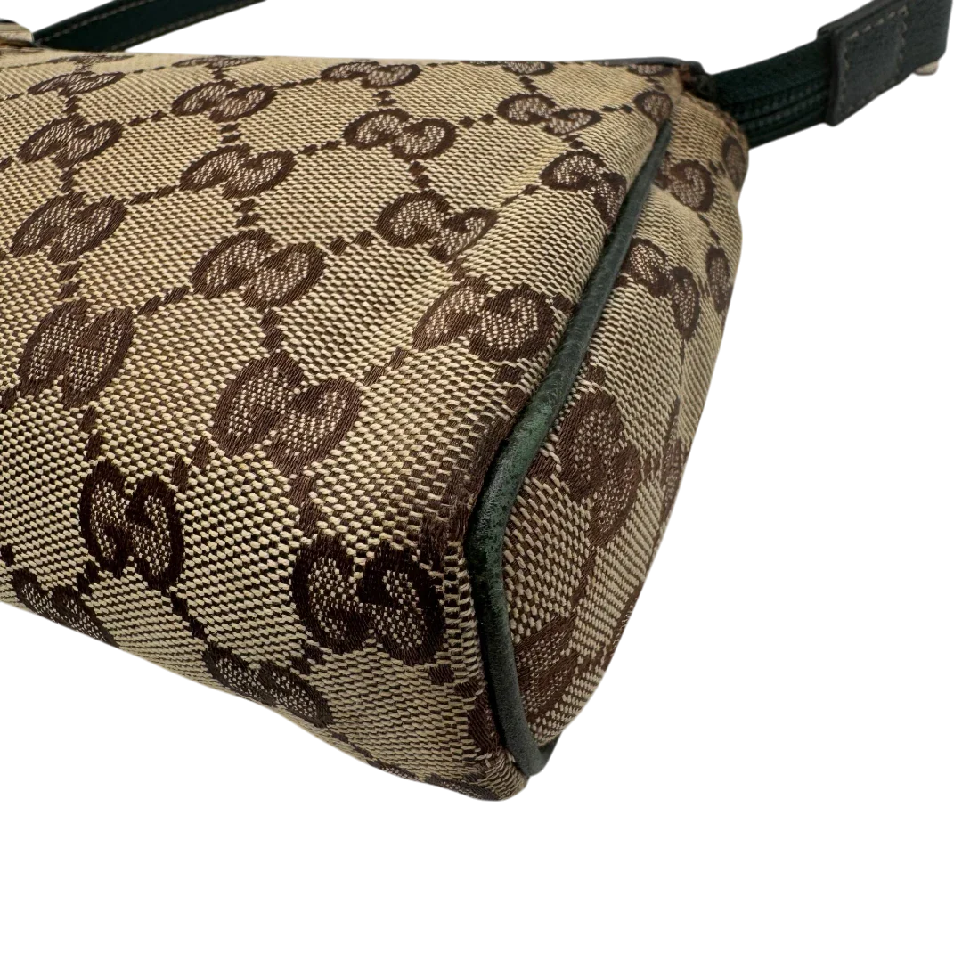 https://cdn.shopify.com/s/files/1/0564/9376/8855/files/Gucci_Pochette_Abbey_monogram_beige_vintage_GG1734.webp?v=1779408432