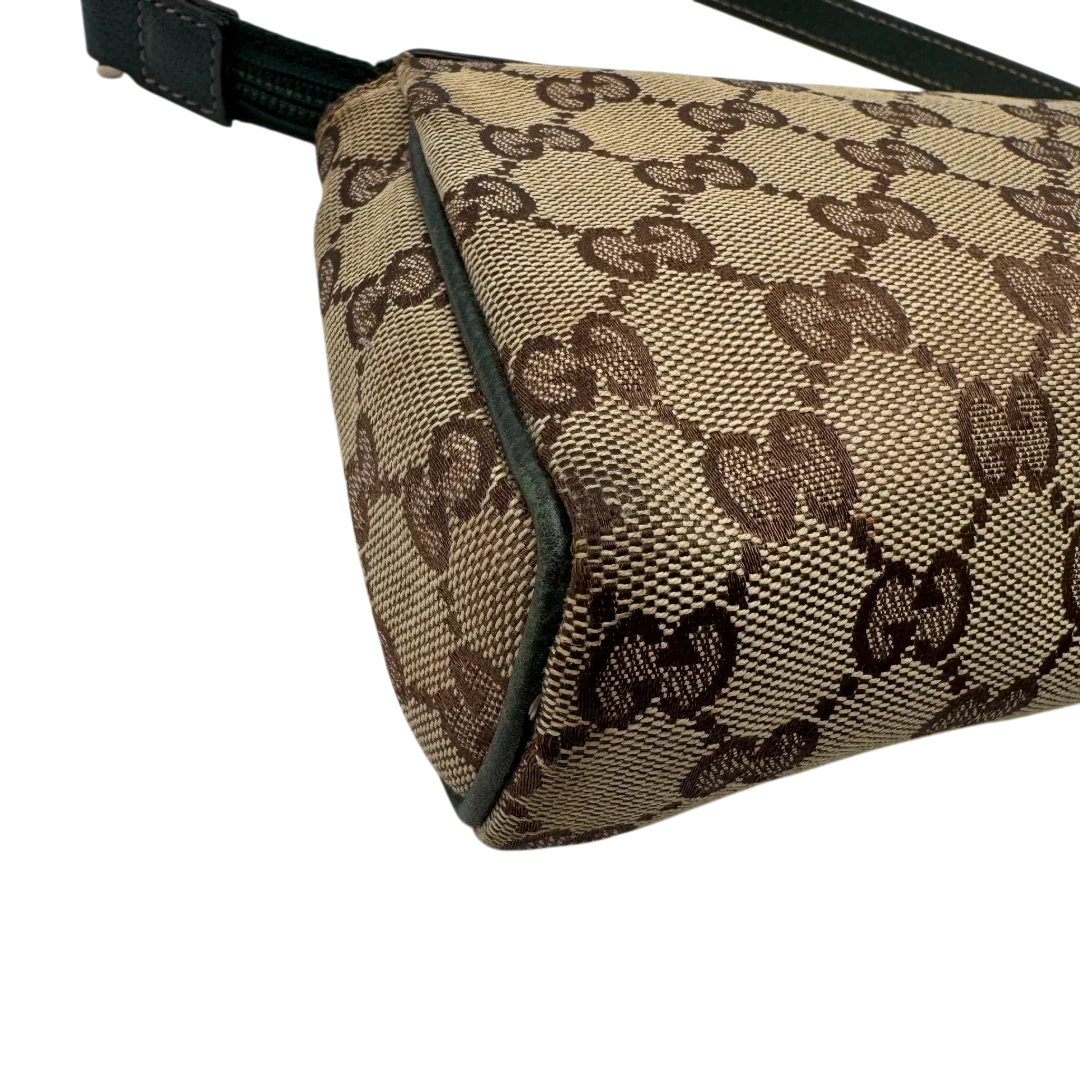 https://cdn.shopify.com/s/files/1/0564/9376/8855/files/Gucci_Pochette_Abbey_monogram_beige_vintage_GG1735.webp?v=1779408432