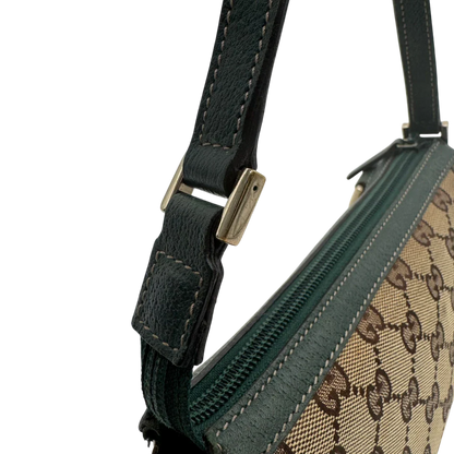 https://cdn.shopify.com/s/files/1/0564/9376/8855/files/Gucci_Pochette_Abbey_monogram_beige_vintage_GG1739.webp?v=1779408432