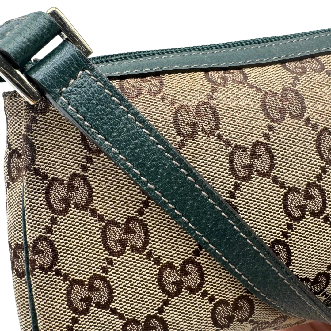 https://cdn.shopify.com/s/files/1/0564/9376/8855/files/Gucci_Pochette_Abbey_monogram_beige_vintage_GG1742.webp?v=1779408432