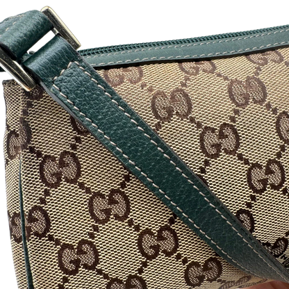 https://cdn.shopify.com/s/files/1/0564/9376/8855/files/Gucci_Pochette_Abbey_monogram_beige_vintage_GG1742.webp?v=1779408432
