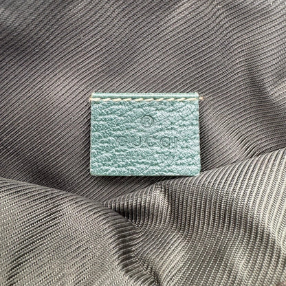 https://cdn.shopify.com/s/files/1/0564/9376/8855/files/Gucci_Pochette_Abbey_monogram_beige_vintage_GG1744.webp?v=1779408433