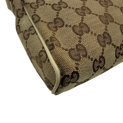 https://cdn.shopify.com/s/files/1/0564/9376/8855/files/Gucci_Pochette_Abbey_monogram_beige_vintage_GG7217.webp?v=1778683324