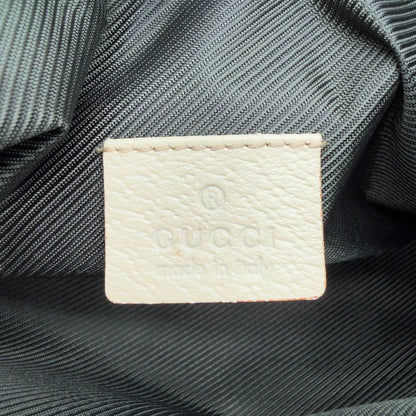 https://cdn.shopify.com/s/files/1/0564/9376/8855/files/Gucci_Pochette_Abbey_monogram_beige_vintage_GG7221.webp?v=1778683324