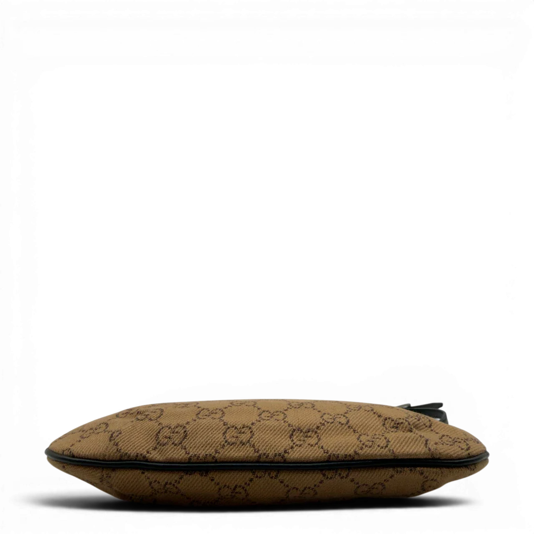 https://cdn.shopify.com/s/files/1/0564/9376/8855/files/Gucci_Pochette_Croissant_monogram_braun_vintage_GG7554.webp?v=1779319552
