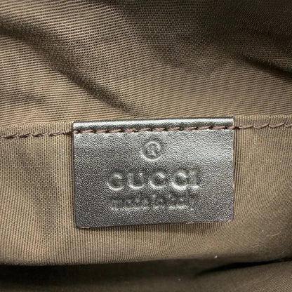 https://cdn.shopify.com/s/files/1/0564/9376/8855/files/Gucci_Pochette_Croissant_monogram_braun_vintage_GG7563.webp?v=1779319553
