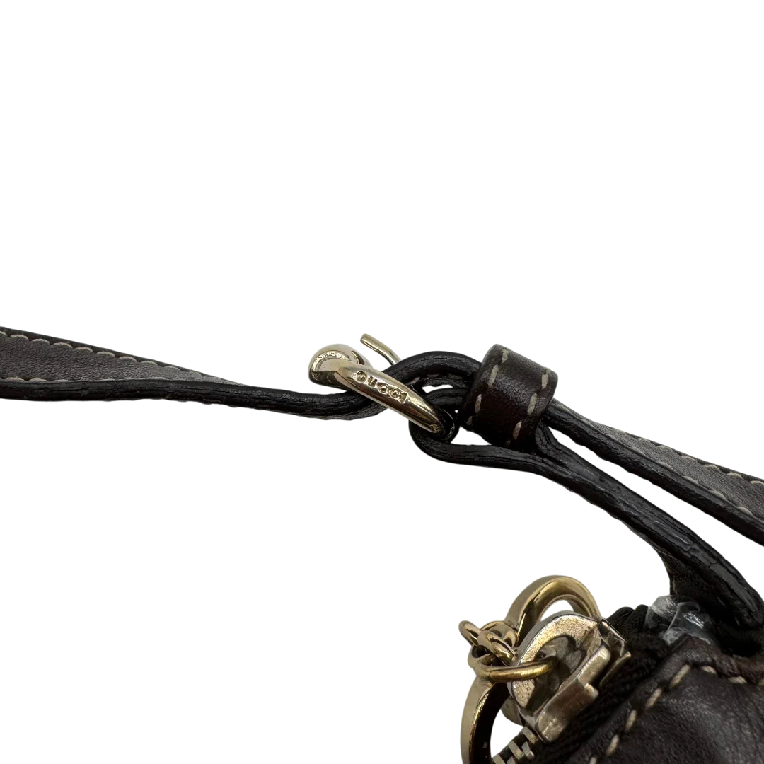https://cdn.shopify.com/s/files/1/0564/9376/8855/files/Gucci_Pochette_Lovely_mit_GG_Herz_monogram_beige_11.webp?v=1783514912