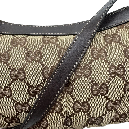 https://cdn.shopify.com/s/files/1/0564/9376/8855/files/Gucci_Pochette_Lovely_mit_GG_Herz_monogram_beige_15.webp?v=1783514913