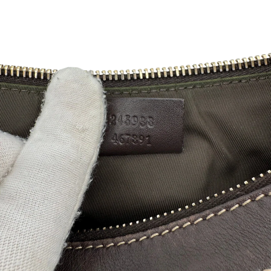 https://cdn.shopify.com/s/files/1/0564/9376/8855/files/Gucci_Pochette_Lovely_mit_GG_Herz_monogram_beige_18.webp?v=1783514912