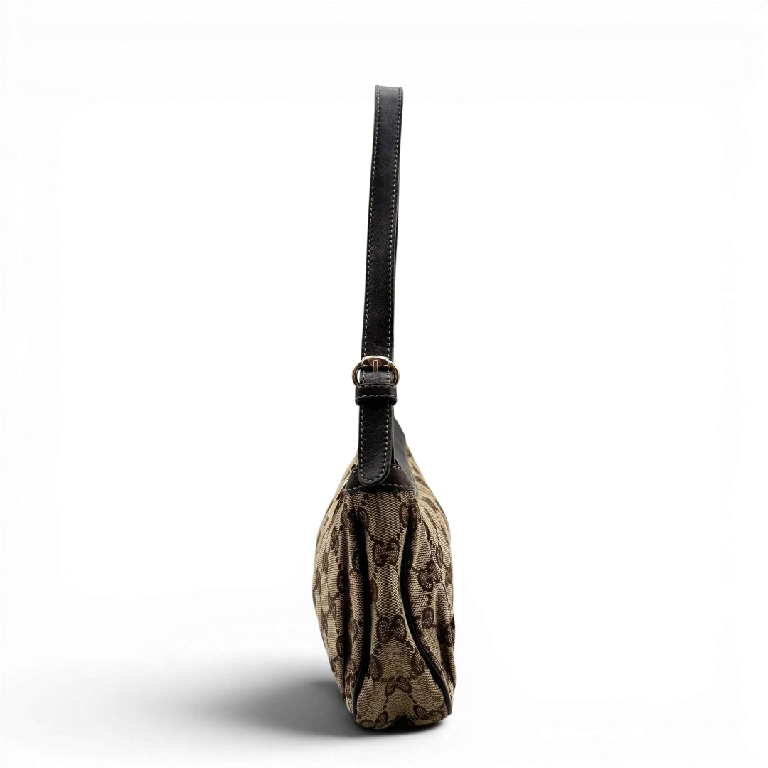 https://cdn.shopify.com/s/files/1/0564/9376/8855/files/Gucci_Pochette_Lovely_mit_GG_Herz_monogram_beige_3.webp?v=1783514912