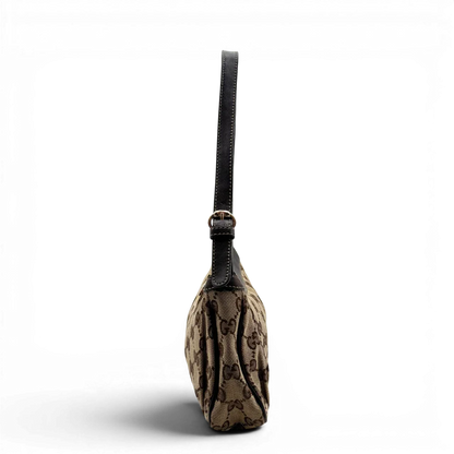https://cdn.shopify.com/s/files/1/0564/9376/8855/files/Gucci_Pochette_Lovely_mit_GG_Herz_monogram_beige_3.webp?v=1783514912
