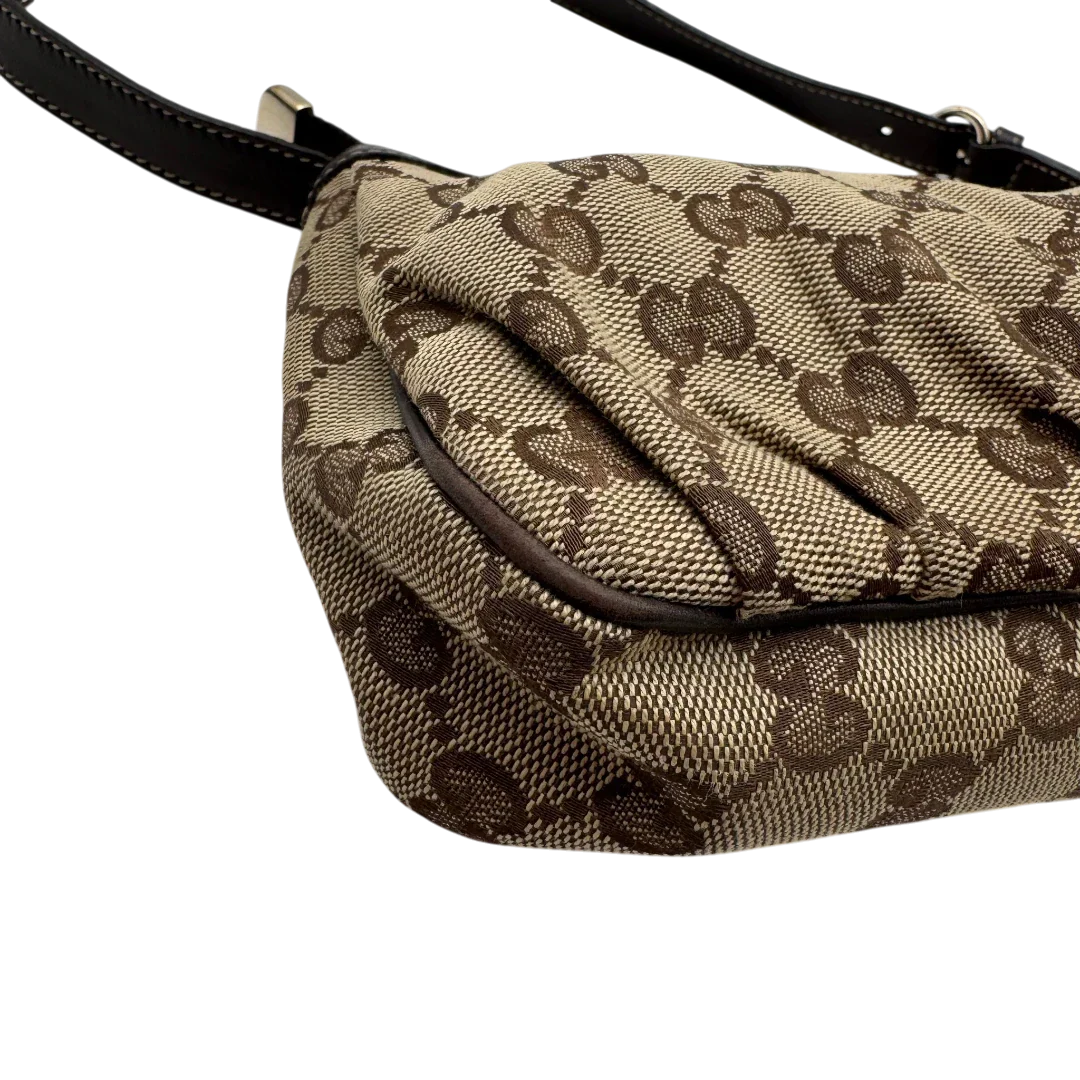 https://cdn.shopify.com/s/files/1/0564/9376/8855/files/Gucci_Pochette_Lovely_mit_GG_Herz_monogram_beige_6.webp?v=1783514912