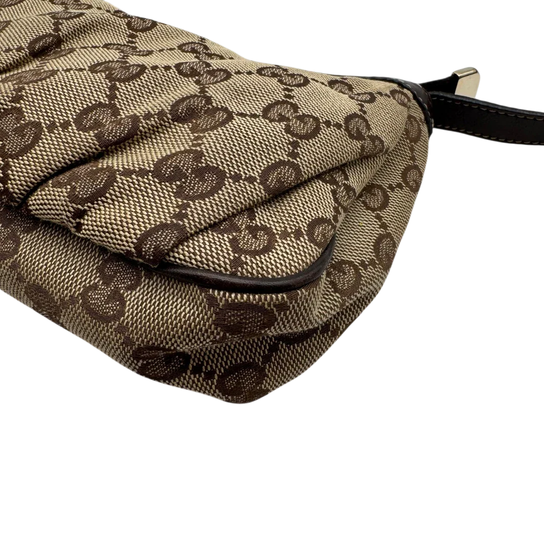 https://cdn.shopify.com/s/files/1/0564/9376/8855/files/Gucci_Pochette_Lovely_mit_GG_Herz_monogram_beige_9.webp?v=1783514912