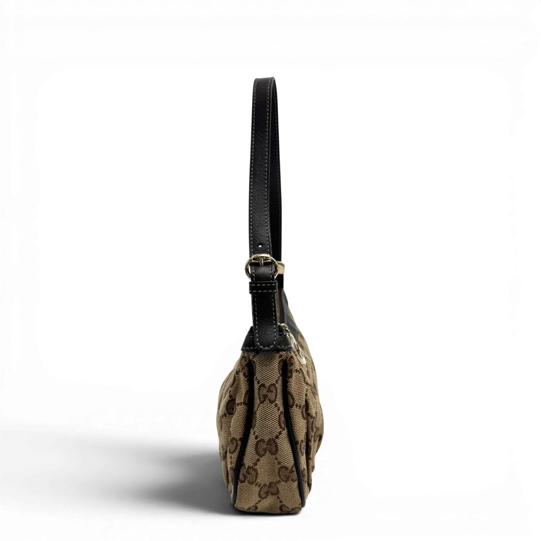 https://cdn.shopify.com/s/files/1/0564/9376/8855/files/Gucci_Pochette_Lovely_mit_GG_Herz_monogram_beige_vintage_GG2370.webp?v=1779966528