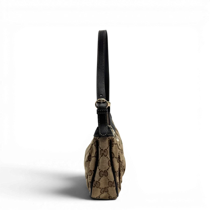 https://cdn.shopify.com/s/files/1/0564/9376/8855/files/Gucci_Pochette_Lovely_mit_GG_Herz_monogram_beige_vintage_GG2370.webp?v=1779966528