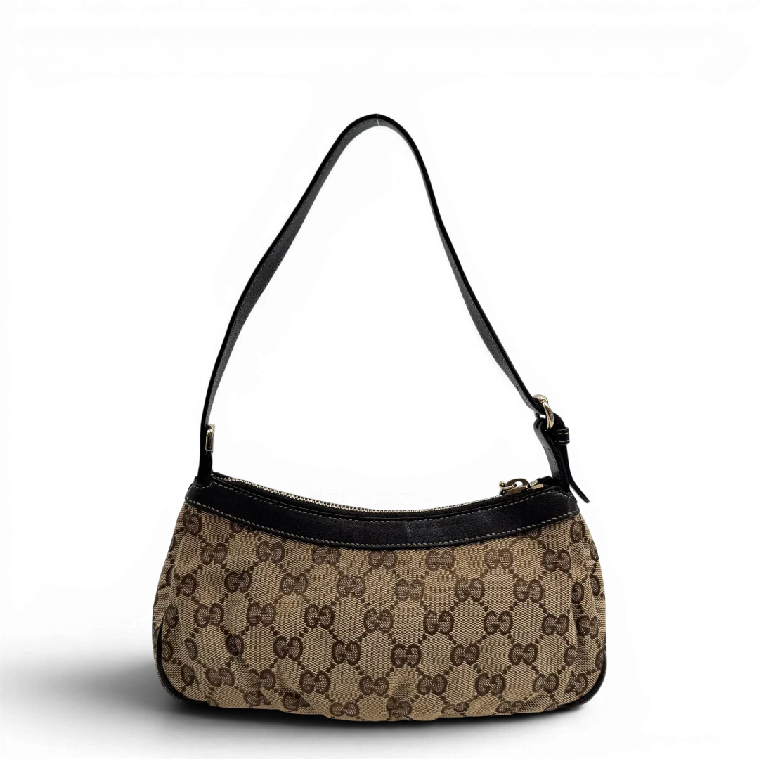 https://cdn.shopify.com/s/files/1/0564/9376/8855/files/Gucci_Pochette_Lovely_mit_GG_Herz_monogram_beige_vintage_GG2372.webp?v=1779966528