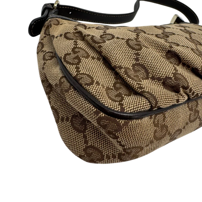 https://cdn.shopify.com/s/files/1/0564/9376/8855/files/Gucci_Pochette_Lovely_mit_GG_Herz_monogram_beige_vintage_GG2377.webp?v=1779966529