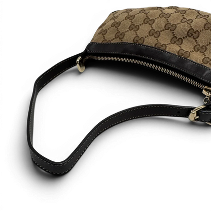 https://cdn.shopify.com/s/files/1/0564/9376/8855/files/Gucci_Pochette_Lovely_mit_GG_Herz_monogram_beige_vintage_GG2379.webp?v=1779966528