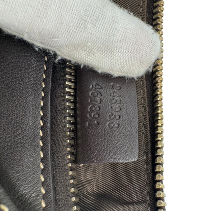 https://cdn.shopify.com/s/files/1/0564/9376/8855/files/Gucci_Pochette_Lovely_mit_GG_Herz_monogram_beige_vintage_GG2386.webp?v=1779966529