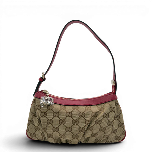 https://cdn.shopify.com/s/files/1/0564/9376/8855/files/Gucci_Pochette_Lovely_mit_GG_Herz_monogram_beige_vintage_GG7501.webp?v=1779286741