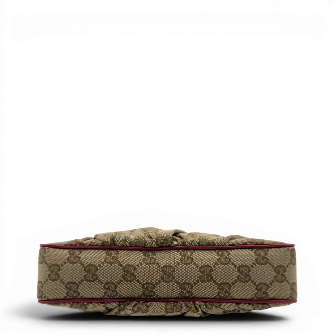 https://cdn.shopify.com/s/files/1/0564/9376/8855/files/Gucci_Pochette_Lovely_mit_GG_Herz_monogram_beige_vintage_GG7505.webp?v=1779286740