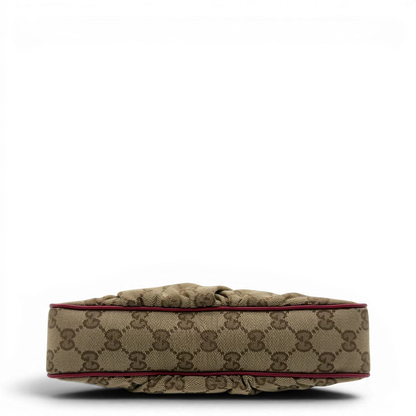 https://cdn.shopify.com/s/files/1/0564/9376/8855/files/Gucci_Pochette_Lovely_mit_GG_Herz_monogram_beige_vintage_GG7505.webp?v=1779286740