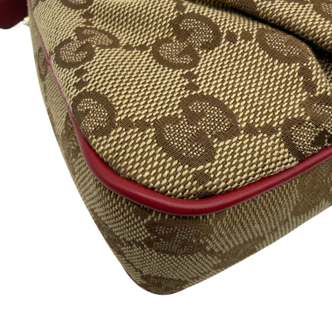 https://cdn.shopify.com/s/files/1/0564/9376/8855/files/Gucci_Pochette_Lovely_mit_GG_Herz_monogram_beige_vintage_GG7507.webp?v=1779286740