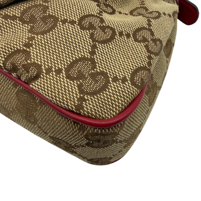 https://cdn.shopify.com/s/files/1/0564/9376/8855/files/Gucci_Pochette_Lovely_mit_GG_Herz_monogram_beige_vintage_GG7508.webp?v=1779286740