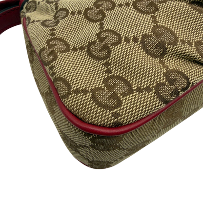 https://cdn.shopify.com/s/files/1/0564/9376/8855/files/Gucci_Pochette_Lovely_mit_GG_Herz_monogram_beige_vintage_GG7509.webp?v=1779286740