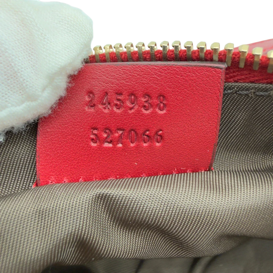 https://cdn.shopify.com/s/files/1/0564/9376/8855/files/Gucci_Pochette_Lovely_mit_GG_Herz_monogram_beige_vintage_GG7516.webp?v=1779286740