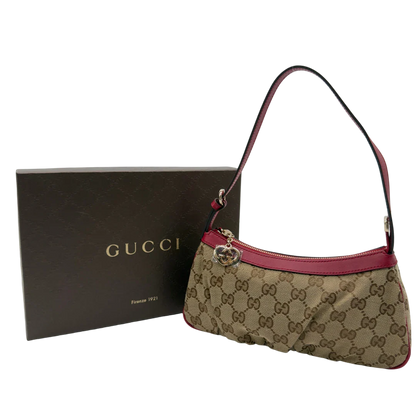 https://cdn.shopify.com/s/files/1/0564/9376/8855/files/Gucci_Pochette_Lovely_mit_GG_Herz_monogram_beige_vintage_GG7518.webp?v=1779286740